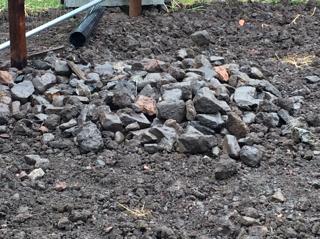Rubble buried in a  Persimmon rear garden